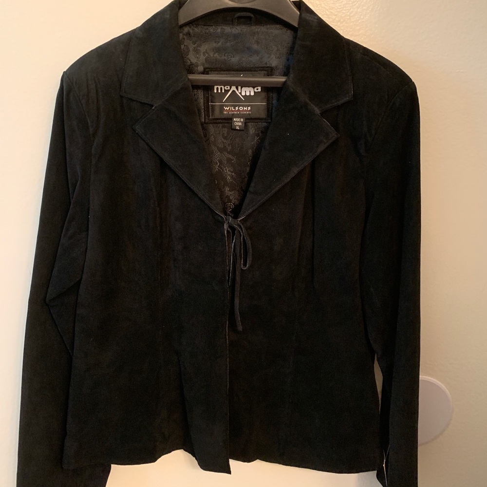 Two piece black leather jacket and pants